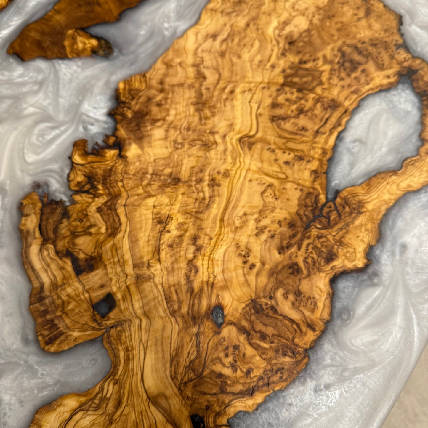 Sold Sample - Handmade Olive Wood Live Edge Oval (Surfboard) Coffee Table w/ Pure White Pearl Swirls.